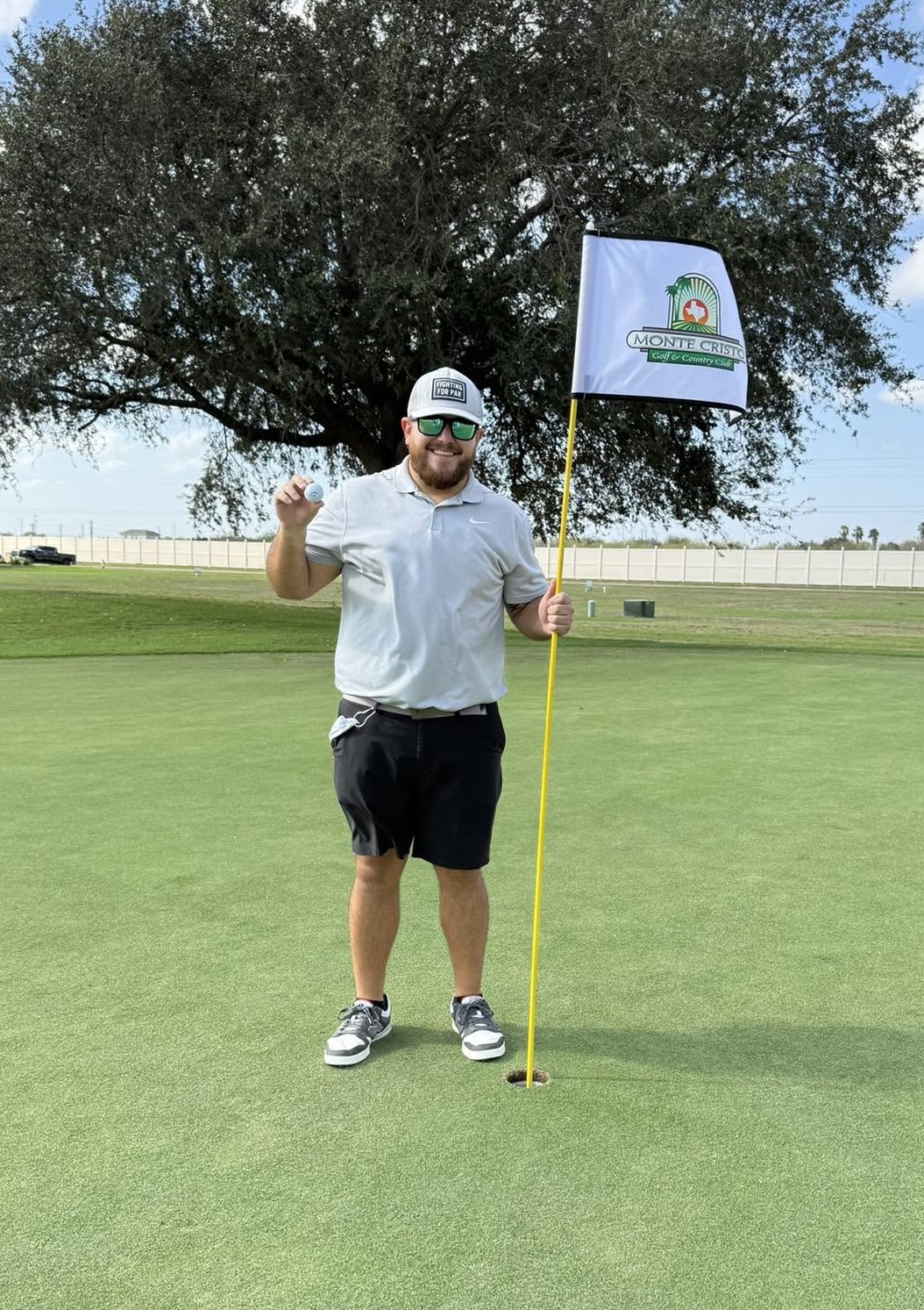 man celebrating his hole-in-one at Monte Cristo Golf Club