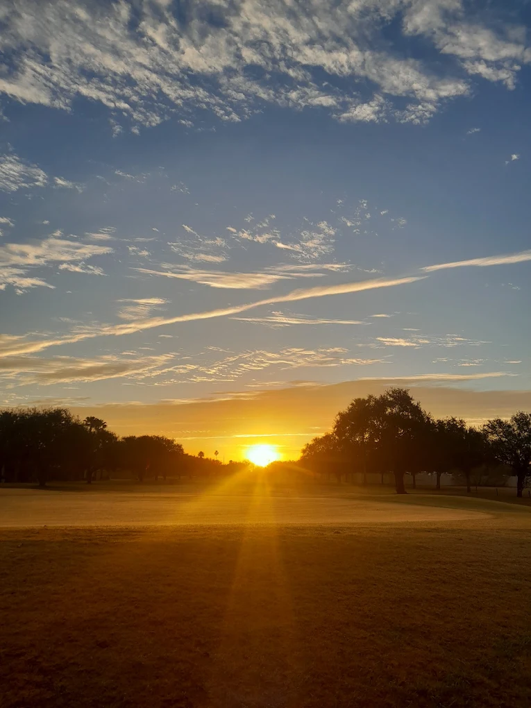 Golden sunset over the course